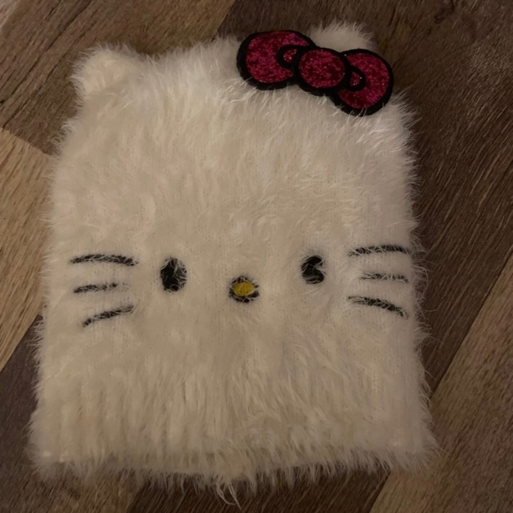 A hello kitty beanie by Sancrio Girls